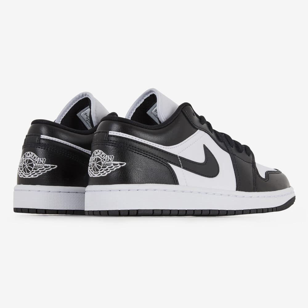 Nike Air Jordan 1 Low Panda sneakers in black and white leather, featuring a classic low-top design with the iconic swoosh and Air Jordan wings logo, exclusive in Europe.
