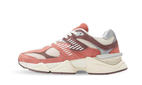 Side view of New Balance 9060 Cherry Blossom sneaker featuring pink and beige tones with white laces and a chunky sole, exclusive sneakers in Europe. The real deal.