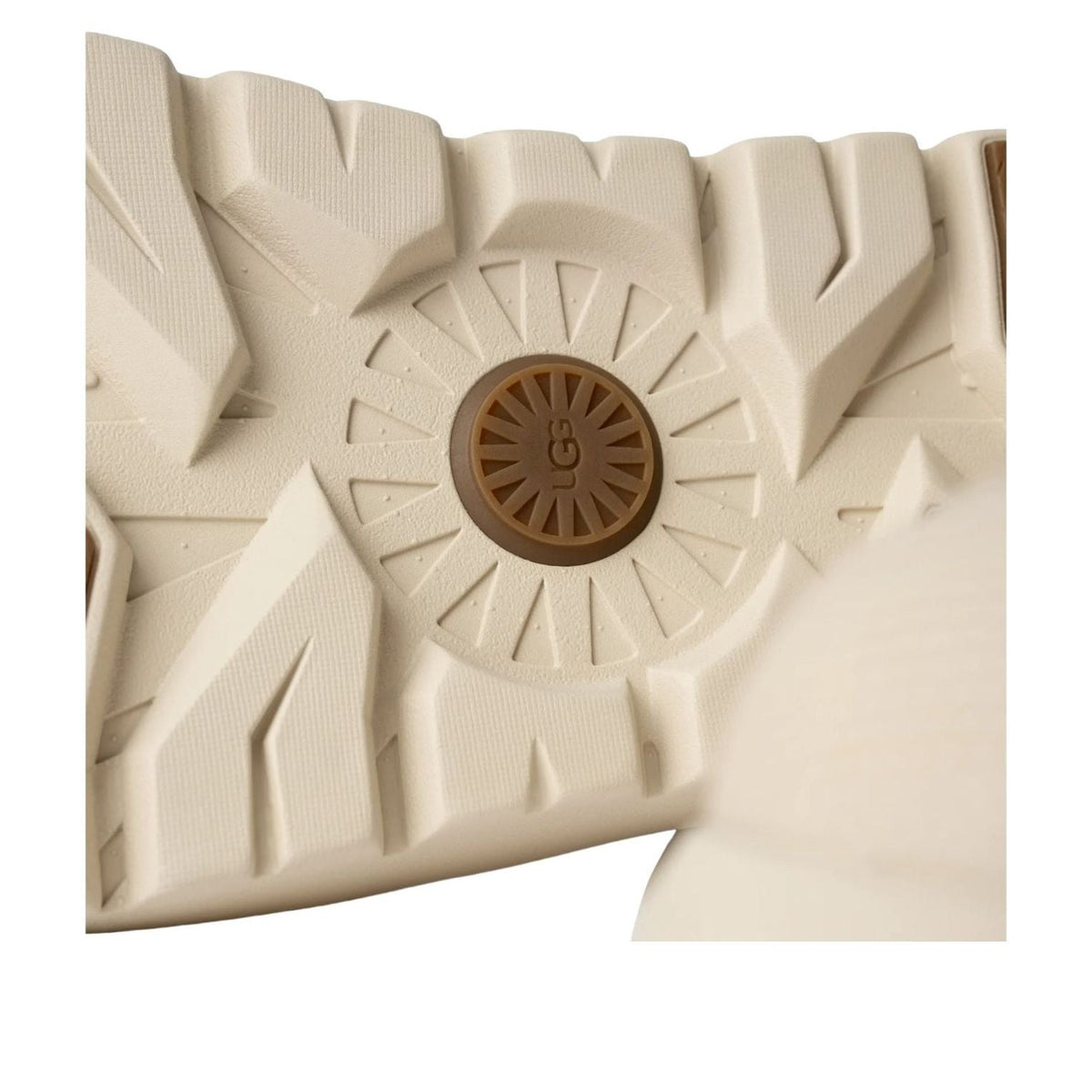 UGG Tasman Weather Hybrid Slipper detailfoto zoolcenter met radiaal patroon en UGG-branding