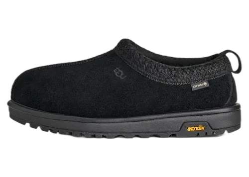 UGG Tasman GTX Slipper Black zijaanzicht, zwart suède met grijze gebreide kraag en Vibram zool