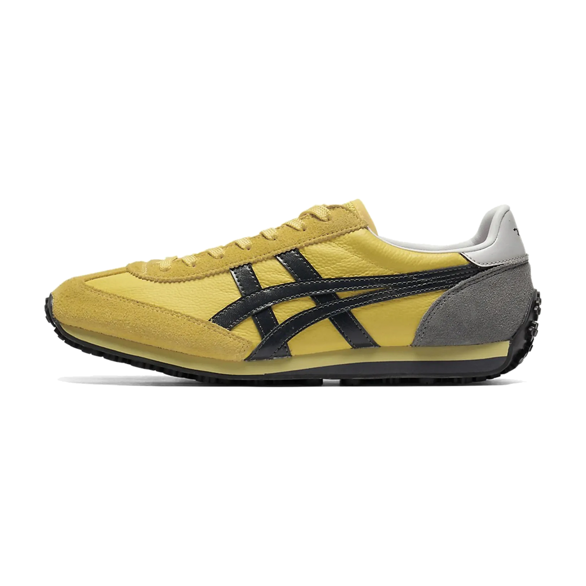 Onitsuka Tiger EDR 78 Faded Yellow Indigo Navy, zijaanzicht met geel suède, marine streepen en grijze hiel
