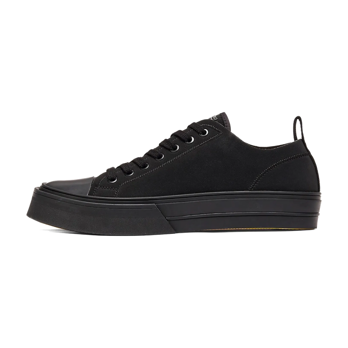 Onitsuka Tiger OK Basketball A75 Lo Black, zijaanzicht van de sneaker met zwart canvas en platform zool