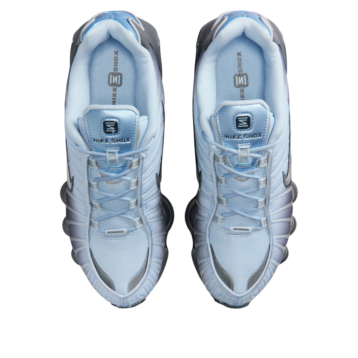 Nike Shox TL Light Armory Blue, bovenaanzicht met vetersluiting en lichtblauwe voering, NIKE SHOX-branding op tongen