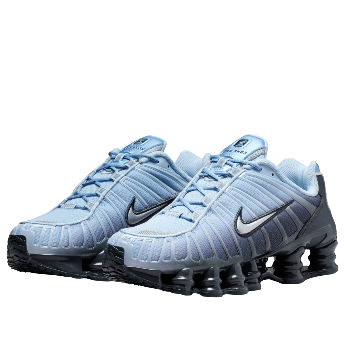 Nike Shox TL Light Armory Blue, driekwart aanzicht vooraanzicht paar met volledig zicht op zool en bovenwerk