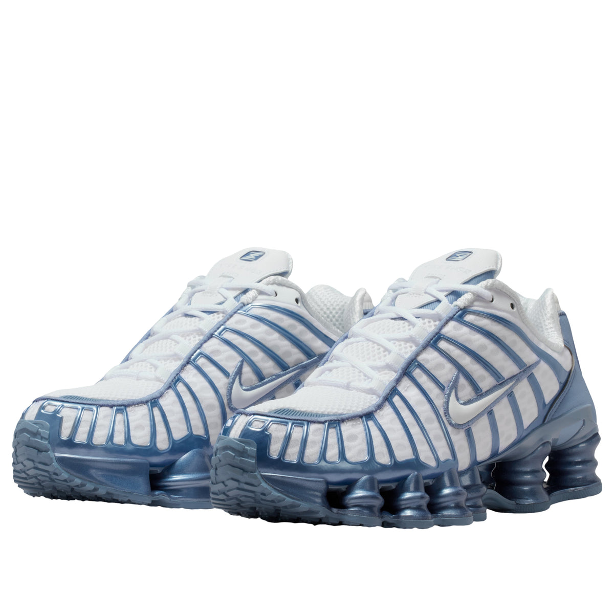 Nike Shox TL White Work Blue driekwart aanzicht van beide schoenen met patroondetails