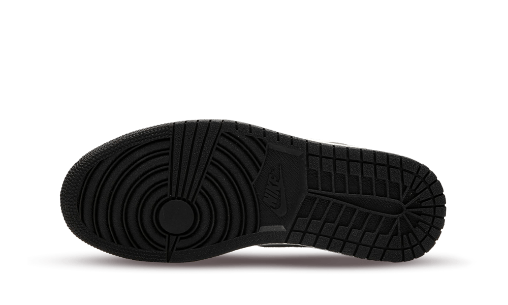 Sole view of Nike Air Jordan 1 High OG Washed Black sneaker showcasing detailed black rubber outsole designed for traction and durability, exclusive in Europe. The real deal.
