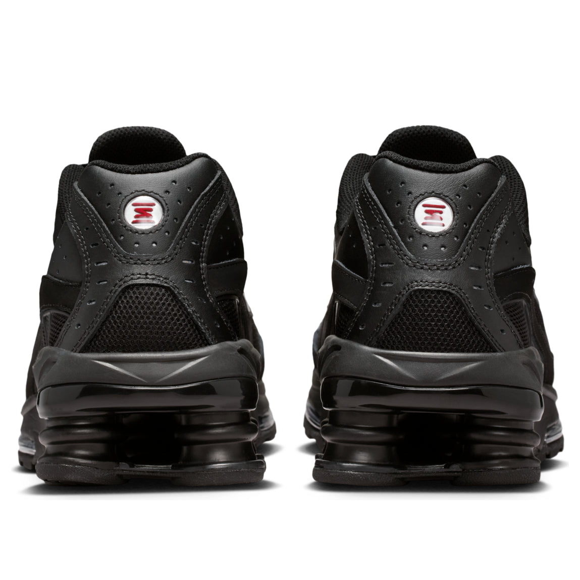 Nike Shox Ride 2 Black achteraanzicht paar, Shox-kolommen en perforatiezool zichtbaar