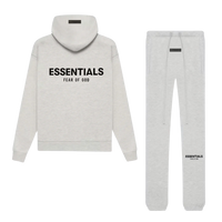 Fear of God Essentials Light Oatmeal Full set featuring a light oatmeal hoodie and matching joggers with black Essentials branding, perfect casual clothing for sneaker enthusiasts.