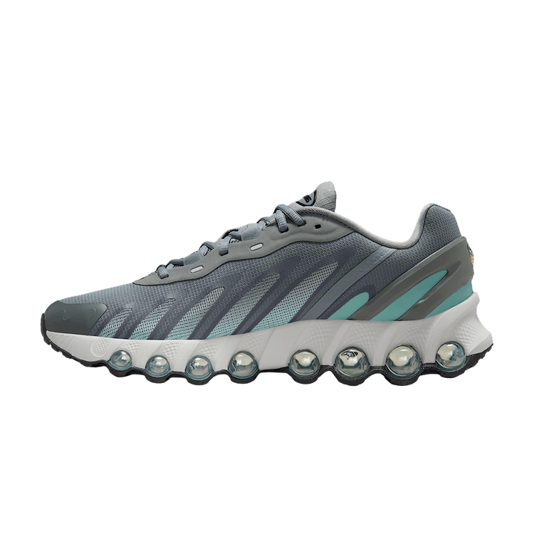 Nike Air Max Dn8 Cool Grey Cannon zijaanzicht met grijze mesh upper, turquoise accent en bollige zoolprofiel