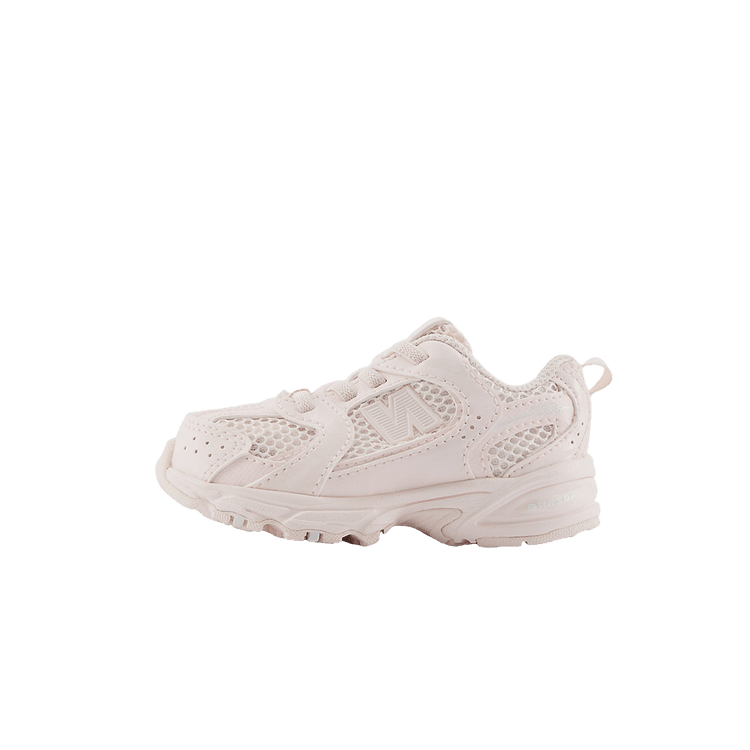 New Balance 530 Bungee Washed Pink (TD), zijaanzicht van babysneaker in roze met mesh-details en dik zoolprofiel