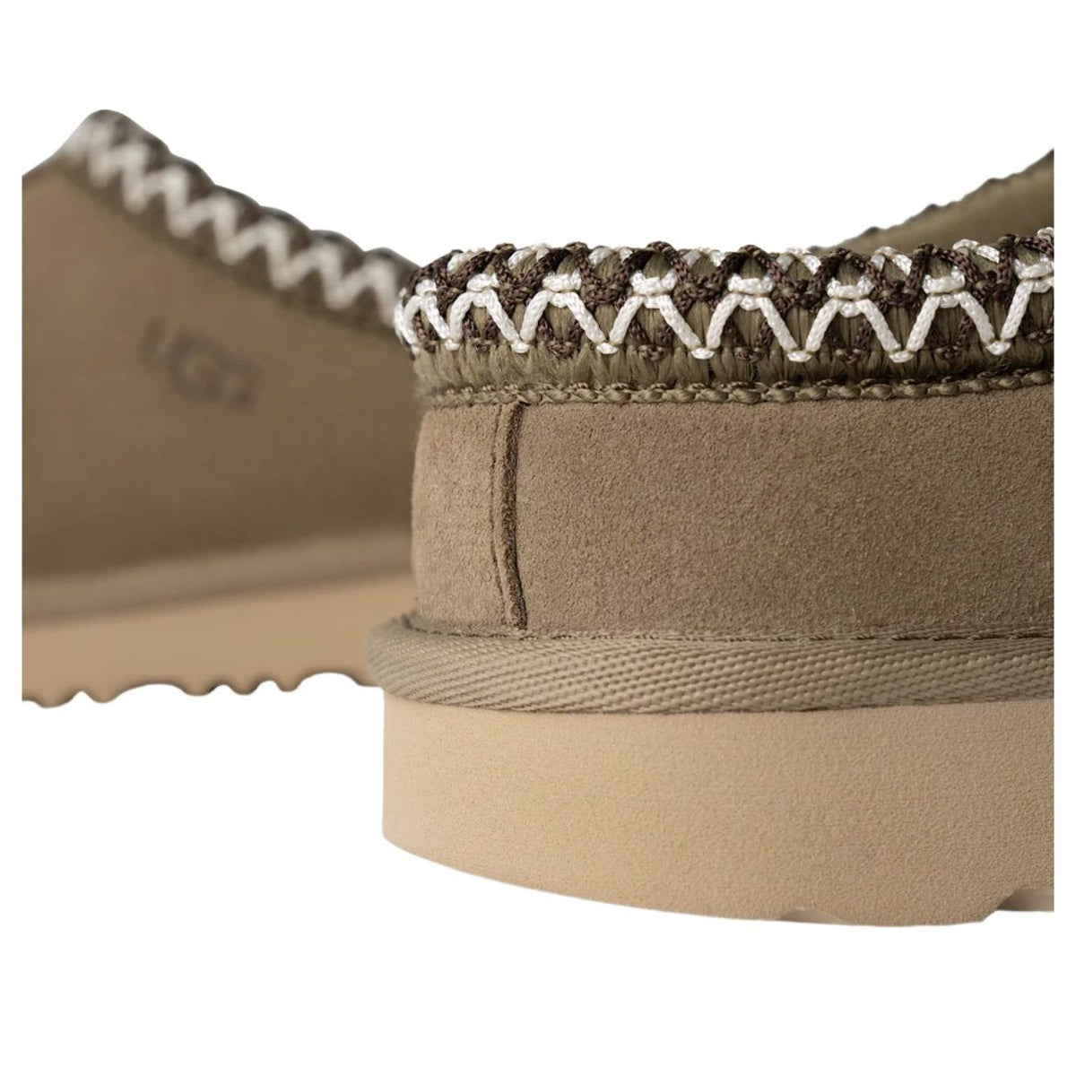 UGG Tasman II Slipper Antilope Kids, detailfoto van gebreide kraag en voetbeddetail