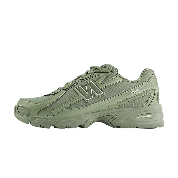 New Balance 740 Dark Olivine Khaki, zijaanzicht met kaki-groen textieloppervlak, N-logo en massieve zool