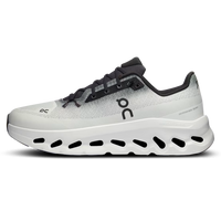 On Running Cloudtilt Black Ivory white and black sneakers with a breathable mesh upper and cushioned sole shown in profile