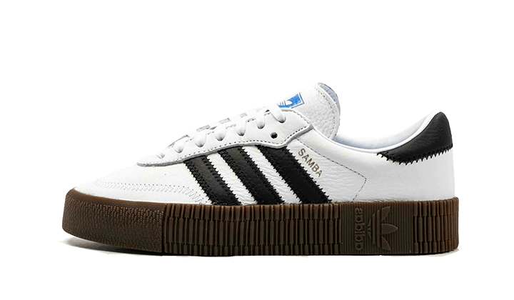 Side view of Adidas Sambarose White Black Gum sneakers featuring white leather upper, black stripes, and thick gum rubber sole, representing exclusive European sneaker style.