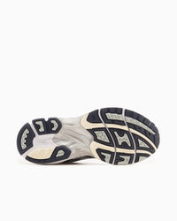 Outsole view of the ASICS Gel-Kayano 14 White Midnight sneaker showcasing durable tread pattern and cushioning designed for performance and comfort, The real deal.