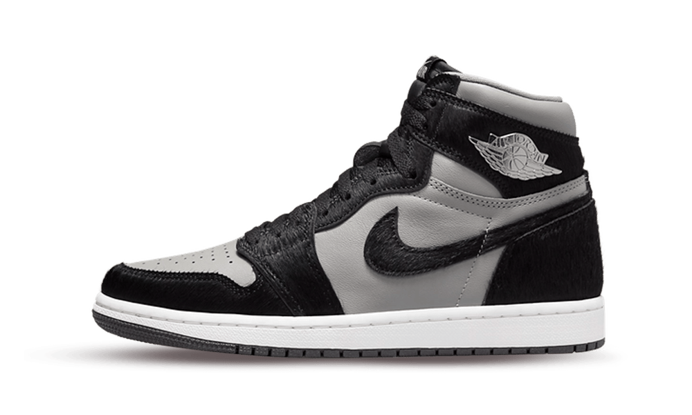 Side view of Nike Air Jordan 1 High Twist 2.0 sneaker in black and gray tones, showcasing premium leather and sleek high-top design, representing exclusive sneakers in Europe.