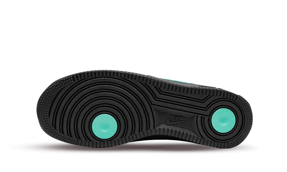 Sole view of Nike Air Force 1 Low SP Tiffany And Co. sneaker featuring black outsole with turquoise circular accents, showcasing exclusive sneaker design available in Europe.