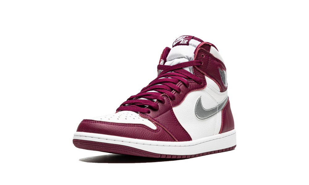 Side view of a Nike Air Jordan 1 High OG Bordeaux sneaker in white, deep red, and silver, showcasing premium leather craftsmanship with exclusive European availability The real deal.