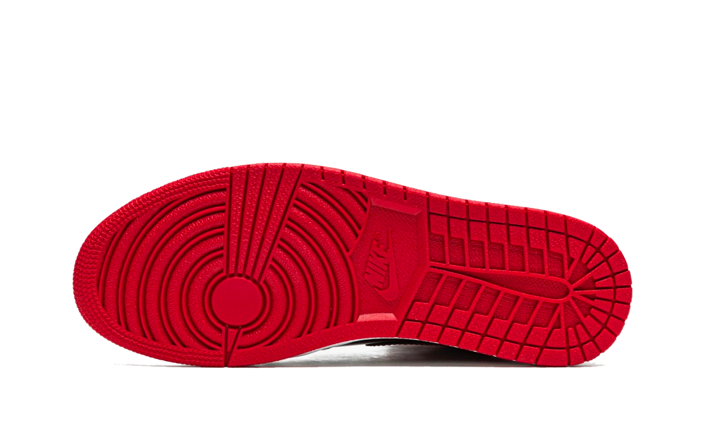 Sole view of Nike Air Jordan 1 High OG Bred Patent sneaker showcasing its vibrant red outsole design, emphasizing quality and exclusive European sneaker style. The real deal.