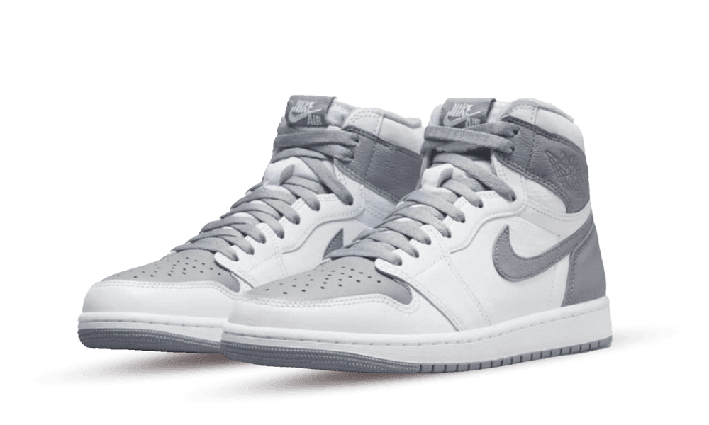 Pair of Nike Air Jordan 1 High OG Stealth sneakers in white and gray tones, showcasing classic high-top design with premium leather and stylish contrast details.