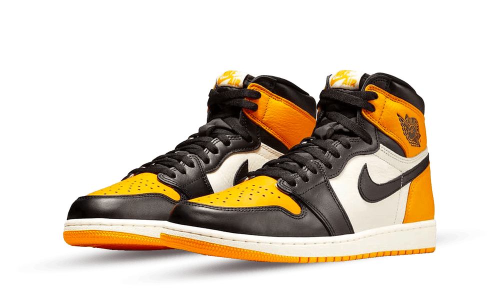 Pair of Nike Air Jordan 1 High OG Yellow Toe sneakers featuring black, white, and bright yellow leather with high-top design and black laces, showcasing exclusive European style.