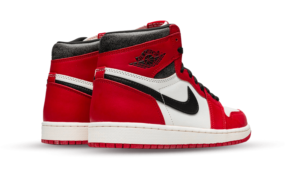 Side view of a pair of Nike Air Jordan 1 High OG Lost and Found sneakers in red, white, and black, displayed against a white background.