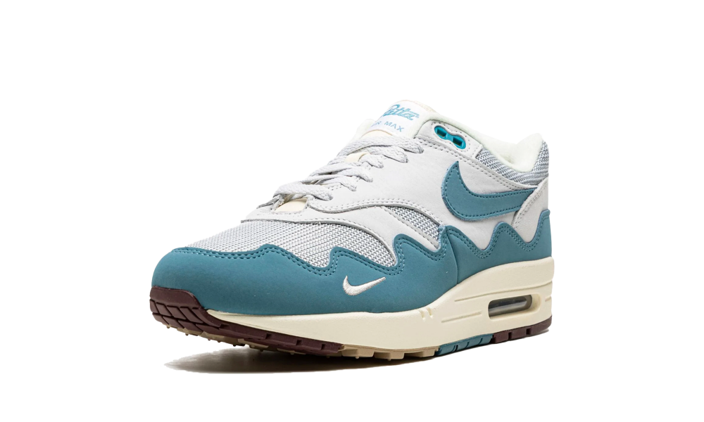 Nike Air Max 1 Patta Waves Noise Aqua sneaker featuring wave-inspired overlays in aqua and noise colors with mesh and suede materials, designed exclusively for Europe, the real deal.