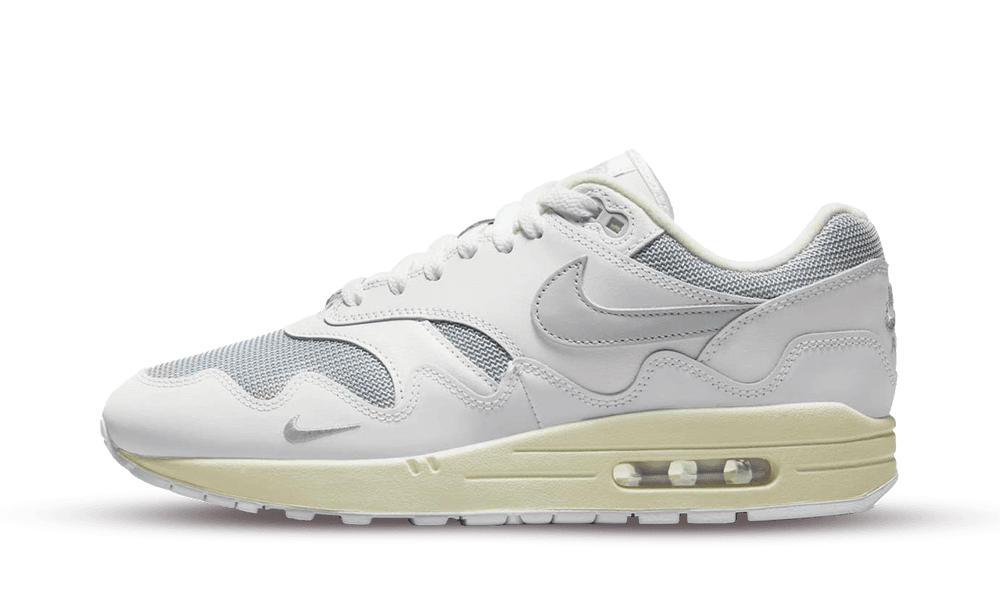 Side view of Nike Air Max 1 Patta Waves White Silver sneaker featuring white and silver accents with a visible air sole unit, exclusive sneaker in Europe, the real deal.