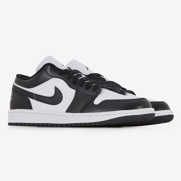 Pair of Nike Air Jordan 1 Low Panda sneakers in black and white, showcasing a sleek low-top design with premium leather for exclusive sneaker enthusiasts in Europe.