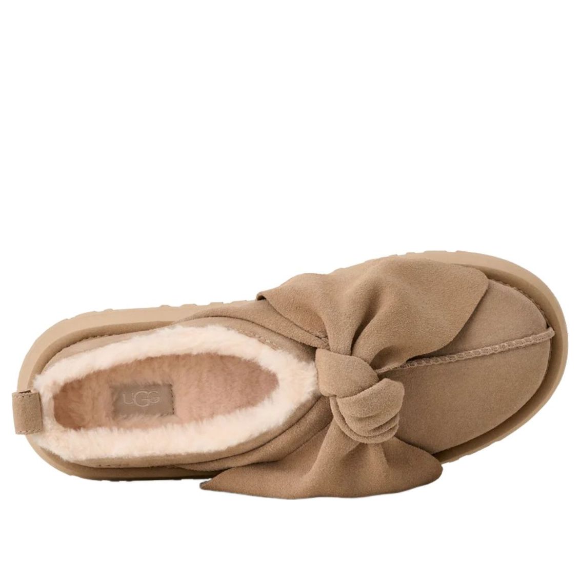 UGG Platform Slip-On Bow Slipper Sand, bovenaanzicht opengevouwen toont fleece binnenwerk