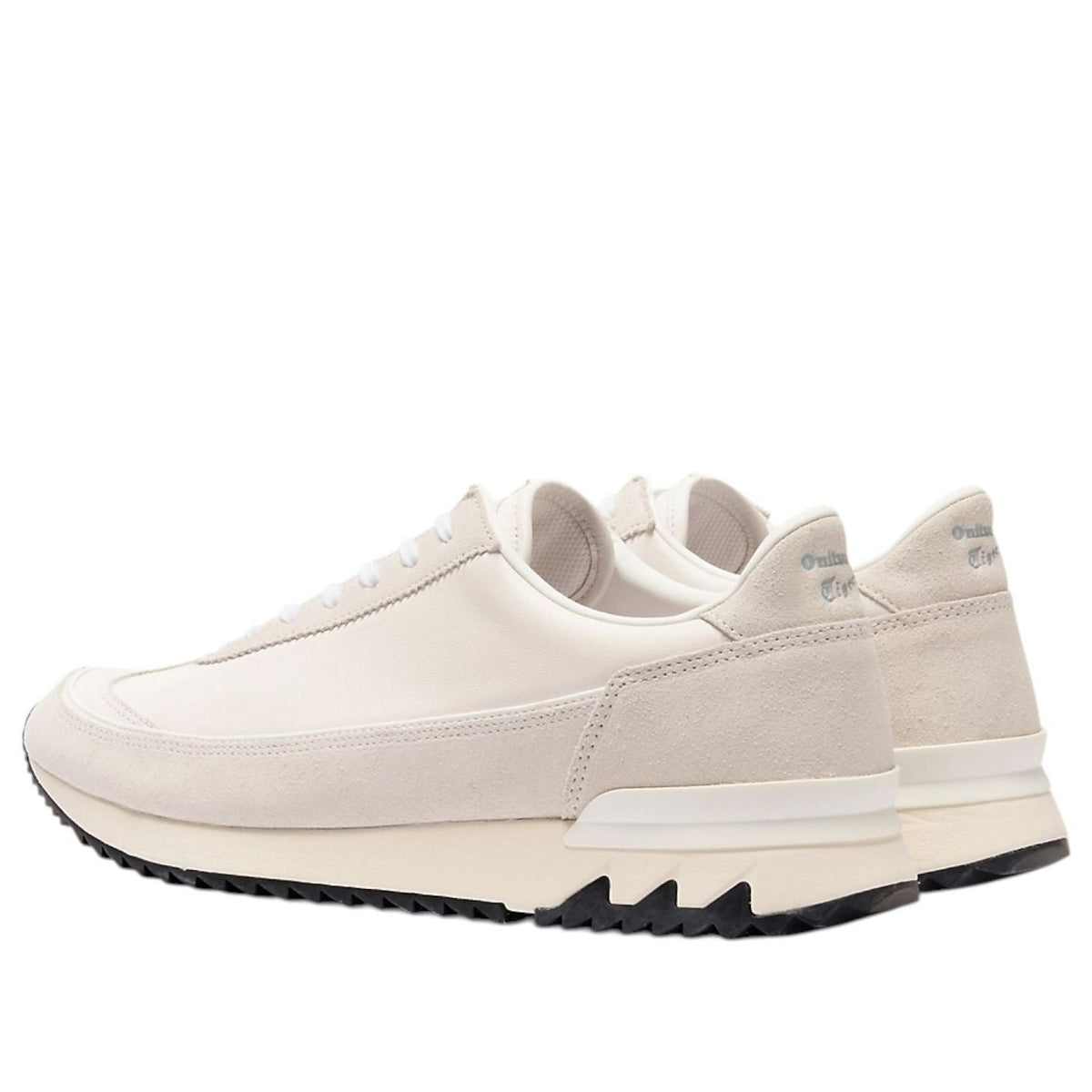 Onitsuka Tiger HSINTI White achteraanzicht met logo op hiel en zwart-witte zoolrand