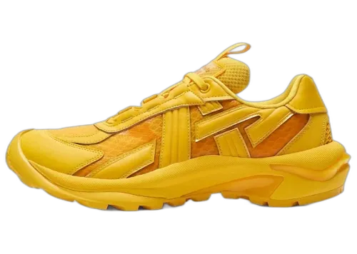 Onitsuka Tiger Tigtrail Yellow, zijaanzicht met gele upper, oranje panelen en dikke gele zool