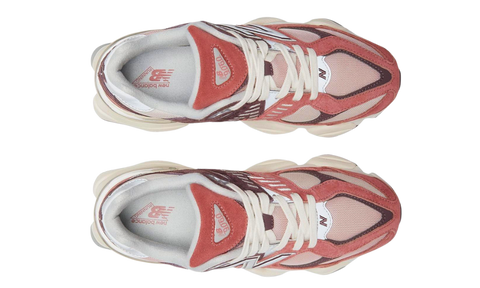 Top view of New Balance 9060 Cherry Blossom sneakers featuring a mix of pink and coral tones with white laces, designed for exclusive sneaker enthusiasts in Europe, the real deal.