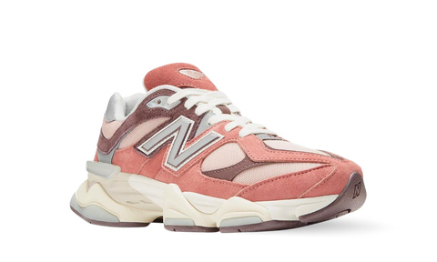 New Balance 9060 Cherry Blossom sneaker in pink and beige tones with white laces and chunky sole, showcasing a stylish and exclusive trainers design.