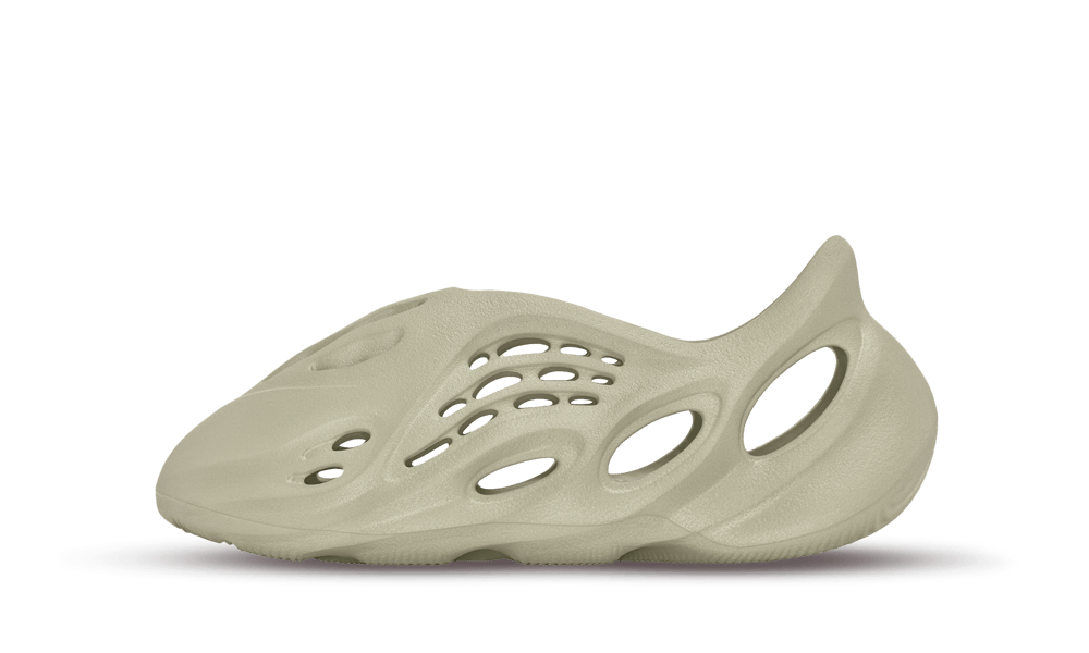 Side profile of Adidas Yeezy Foam RNNR Stone Salt sneaker in light beige tones with sculpted, futuristic design and ventilated cutouts, exclusive sneakers in Europe.
