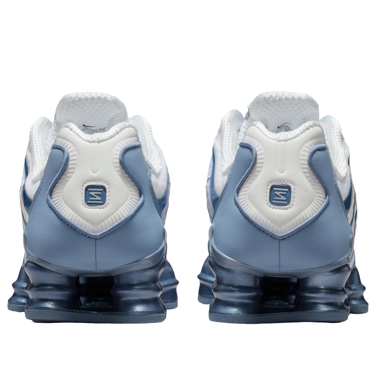 Nike Shox TL White Work Blue achteraanzicht met blauwe Shox-tubes en gestructureerde hielkap