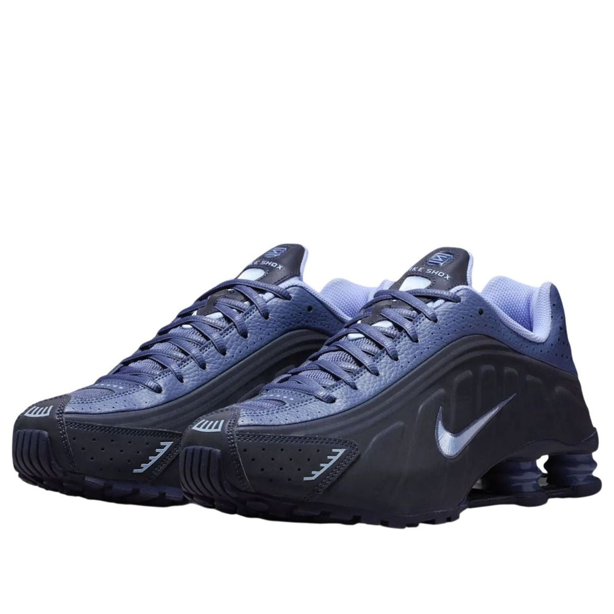 Nike Shox R4 Obsidian Reflective paar samen, blauwe neus met zwarte voorvoet en glanzende Shox-kolommen