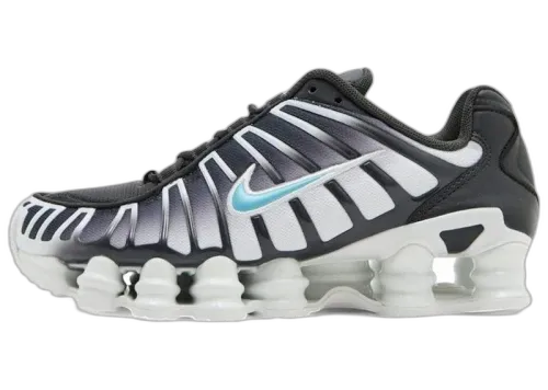 Nike Shox TL Anthracite Denim Turqouise zijaanzicht met zwart-witte strepen en turquoise swoosh, witte Shox-zool