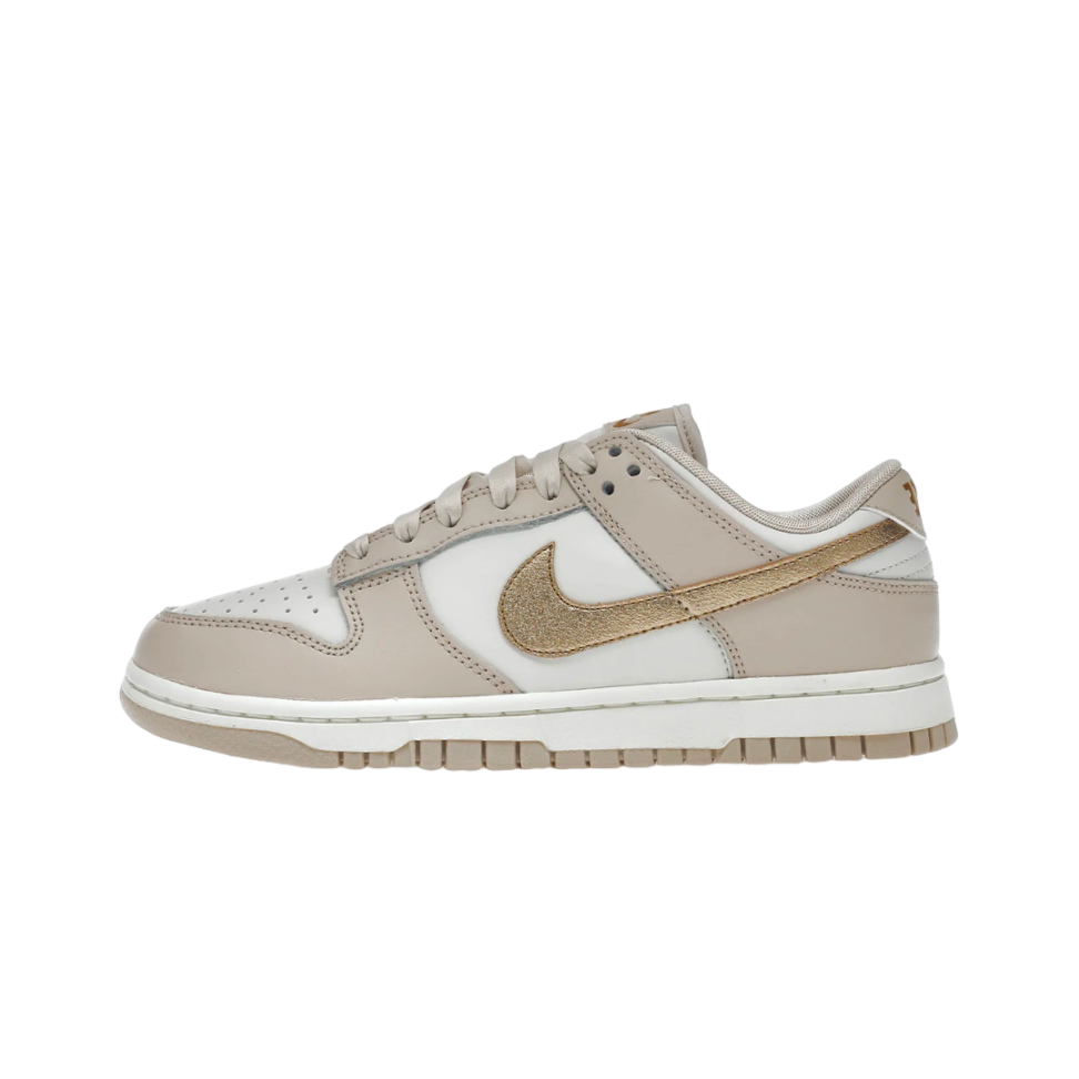 Side view of Nike Dunk Low Phantom Metallic Gold sneaker featuring beige and white leather panels with a metallic gold swoosh, exclusive sneaker style in Europe, the real deal.