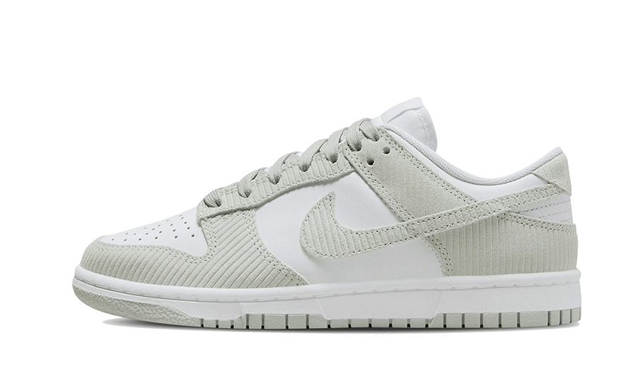 Side view of Nike Dunk Low Grey Corduroy sneaker featuring a grey corduroy upper and white accents, showcasing exclusive European style and the real deal in trainers.