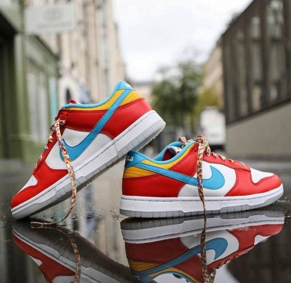 Nike Dunk Low QS LeBron James Fruity Pebbles sneakers with vibrant red, blue, yellow, and white colors, featuring a playful, colorful laces design, the real deal.