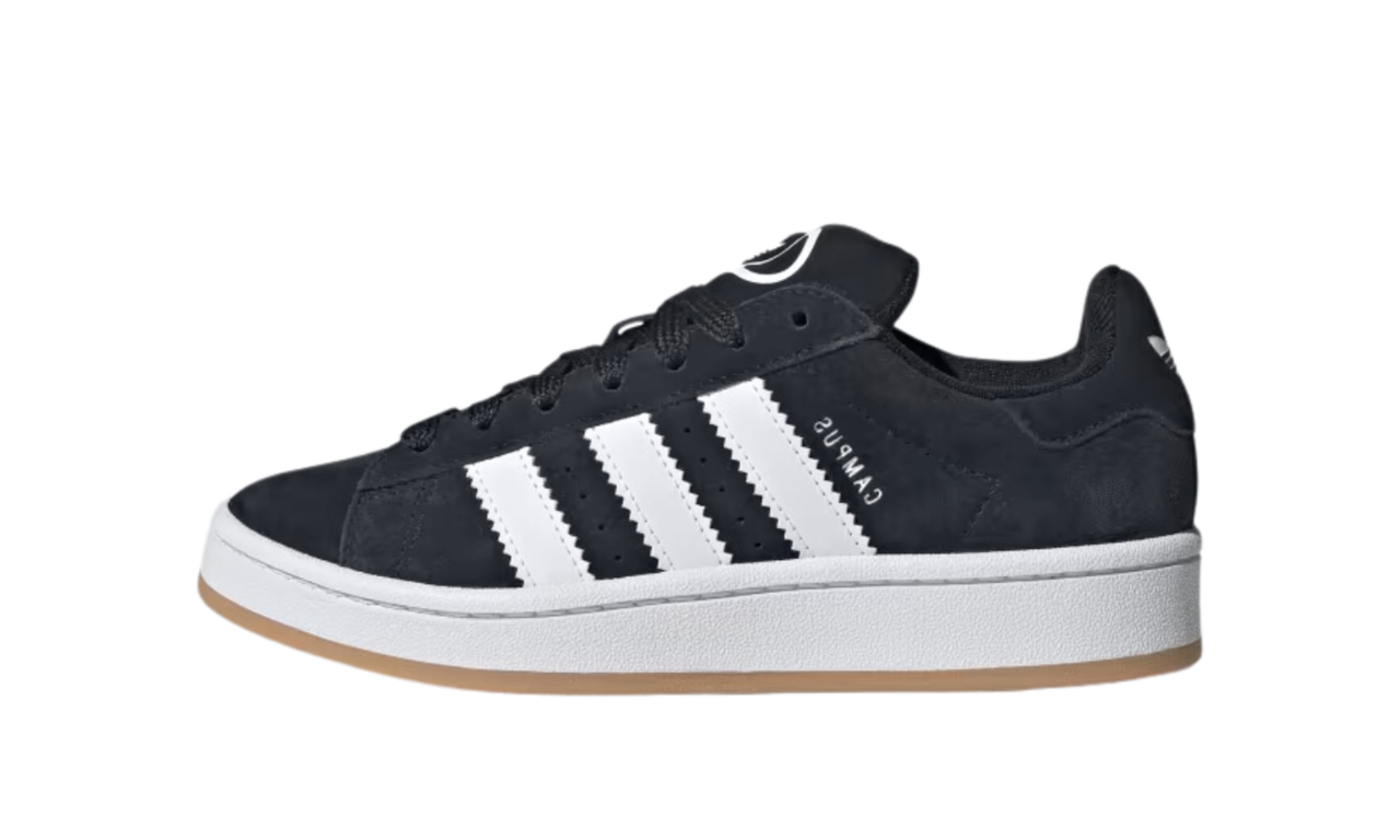 Side view of Adidas Campus 00s GS Core Black Kids sneaker featuring black suede upper, white three stripes, and gum sole, showcasing classic European exclusive trainers.