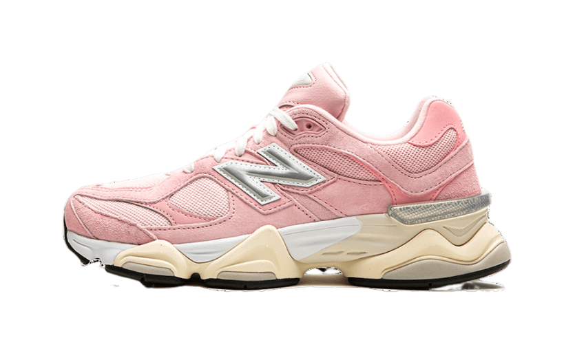 Side view of the New Balance 9060 Crystal Pink sneaker featuring a pink upper with mesh and suede details, thick beige and white sole, and white laces, exclusive in Europe.