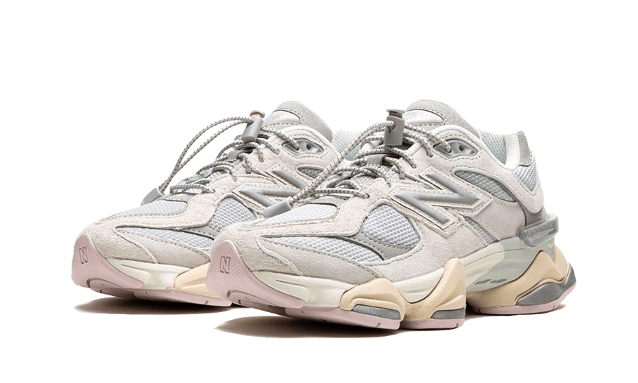 Pair of New Balance 9060 Grey Lilac sneakers featuring a modern chunky design in soft grey and lilac tones, exclusive and stylish footwear perfect for sneaker enthusiasts.