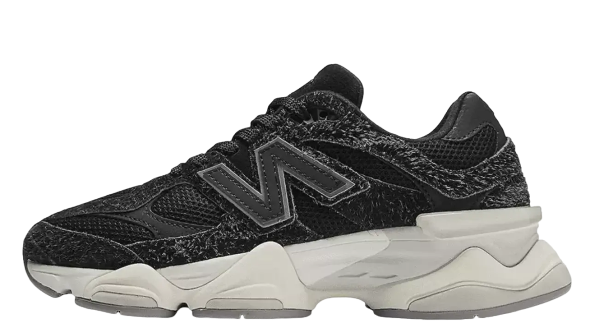 New Balance 9060 Sea Salt Black sneaker showcasing a modern design with black textured upper and contrasting light sea salt sole, exclusive trainers for Europe, the real deal.