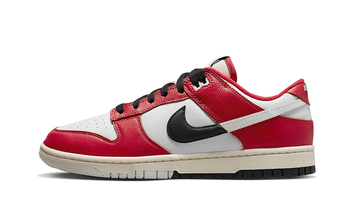 Side view of a Nike Dunk Low Chicago Split sneaker in red, white, and black leather, showcasing the classic design of exclusive sneakers available across Europe. The real deal.