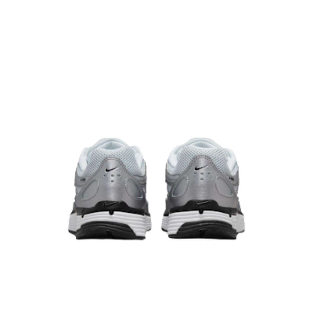 Rear view of Nike P-6000 Metallic Silver Pure Platinum sneakers showcasing metallic silver and pure platinum tones with black and white accents, exclusive in Europe. The real deal.