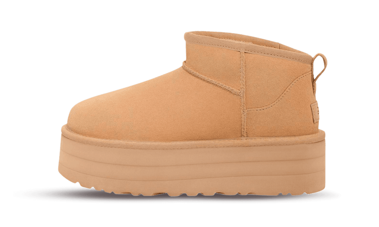 Side view of UGG Classic Ultra Mini Platform Driftwood sneaker in light brown with thick platform sole, showcasing soft suede material and minimalistic design.