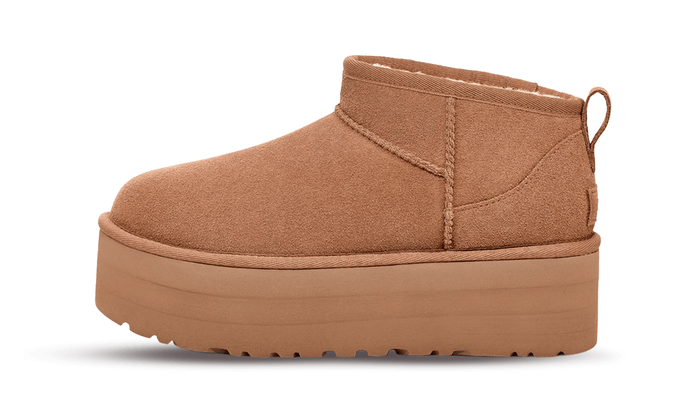 Side view of UGG Classic Ultra Mini Platform Chestnut sneaker-style boots featuring a suede upper and thick platform sole, exclusive in Europe, the real deal.