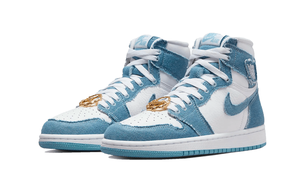 Pair of Nike Air Jordan 1 High OG Denim sneakers with white leather and blue denim overlays, featuring white laces and exclusive European release design, the real deal.